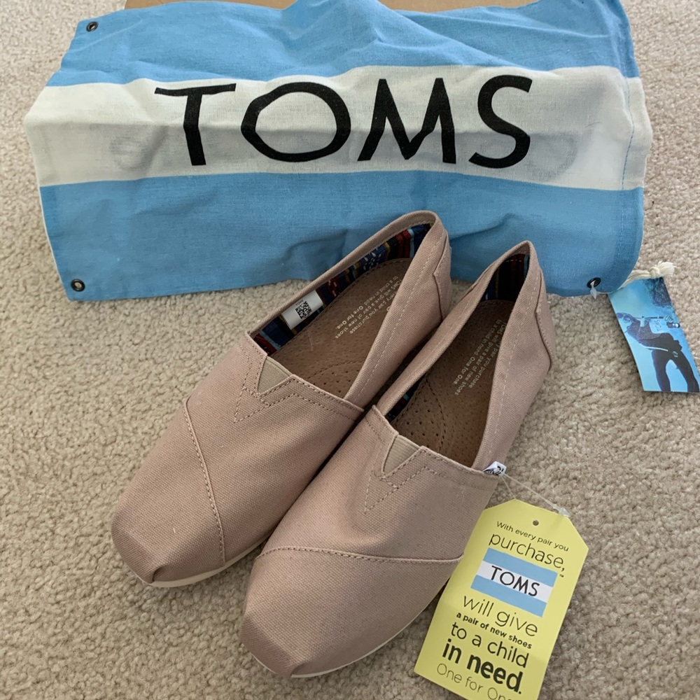 NWT toms slip ons